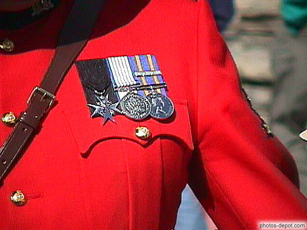 Medal atop breast officer police acclivity Canadian woman photo