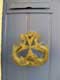 Pommeau de porte en croix de malte sur deux dauphins